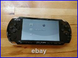 Sony PSP 3003 (piano black) boxed Inc Crash of the Titans and Case