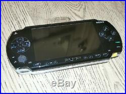 Sony PSP Bundle Piano Black 6 Games, Charger, Memory Cards, Adapter, and Case