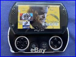 Sony PSP GO Custom Firmware Gta Metal Gear 16gb Charger /case