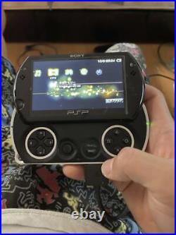 Sony PSP GO Playstation Portable PSP-N1000 Piano Black Console withCase, Many Games