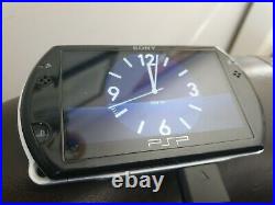 Sony PSP Go 16GB Handheld System Black. With Games, Case And Charger