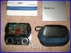 Sony PSP Go Launch Edition 16GB Piano Black Handheld System, Charger, Case, Games