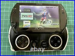 Sony PSP Go Piano Black Handheld System + 15 Games + Sony Charger + Travel Case