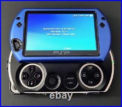 Sony PSP Go with Charger, Dock, Component Cables, Case, Storage Upgrade & Games