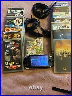 Sony PSP Portable System Piano Black-with case And with charger and 14 games