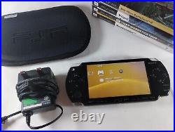 Sony PSP Slim 2003 With New Battery Genuine Charger Memory Card Case & Games