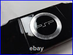 Sony PSP Slim 2003 With New Battery Genuine Charger Memory Card Case & Games