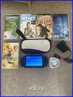 Sony PSP console 1003 piano black with 6 games, case and power supply (2)