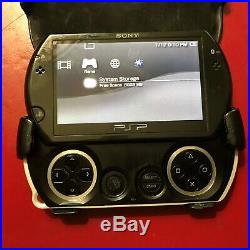 Sony PSP go 16GB Piano Black Handheld System With Charger, and Case