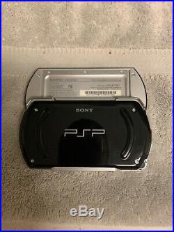 Sony PSP go Launch Edition 16GB Piano Black Handheld System With Protective Case