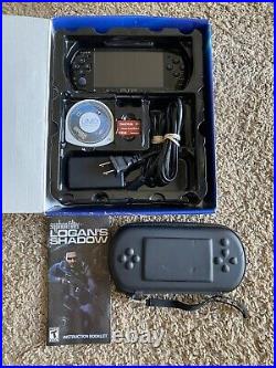 Sony PlayStation PSP 3001 Console Black with 2GB Mem Card, charging cord and case