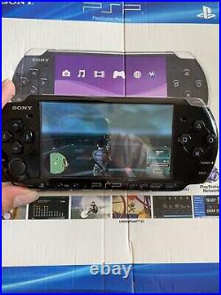 Sony PlayStation PSP 3001 Console Black with 2GB Mem Card, charging cord and case