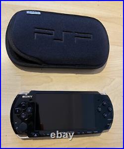 Sony PlayStation Portable PSP3003 Piano Black 2GB Slim Console Soft Case 2 Games