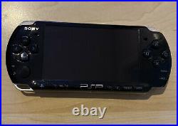 Sony PlayStation Portable PSP3003 Piano Black 2GB Slim Console Soft Case 2 Games