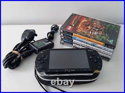 Sony Psp 1003 Piano Black Console With 5 Games Charger/1gb Memory Card & Case