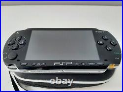 Sony Psp 1003 Piano Black Console With 5 Games Charger/1gb Memory Card & Case