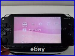 Sony Psp 1003 Piano Black Console With 5 Games Charger/1gb Memory Card & Case