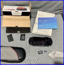 Sony psp 3000 console bundle piano black VGC 2 games 3 batteries case and 32gb