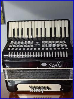 Stella 32 bass, 30 key black accordion used