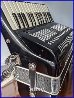 Stella 32 bass, 30 key black accordion used