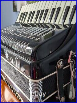 Stella 32 bass, 30 key black accordion used