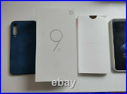 Unlocked Xiaomi Mi 9 SE 64GB Piano Black/3 x Cases/Mi Earbuds/Boxed Bundle