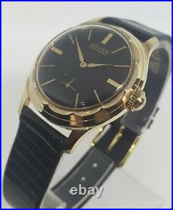 Vintage Gruen 415, exquisite piano black dial and gold plated scalloped case