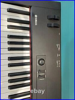 Yamaha CP33 stage piano, stand, pedal and flight case