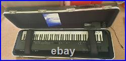 Yamaha CP33 stage piano with flight case and accessories
