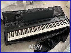 Yamaha P-105 Digital Piano with 2 pedals, stand, dust cover and storage case