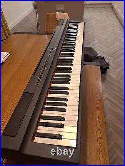 Yamaha P125 Digital Piano hardly used with stand, carry case and sustain pedal