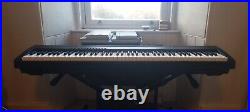 Yamaha P95 digital piano with case, stand, pedal and replacement keys