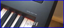 Yamaha P95 digital piano with case, stand, pedal and replacement keys