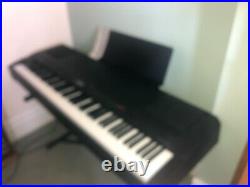 Yamaha electric keyboard piano (88 keys) with customised flight case